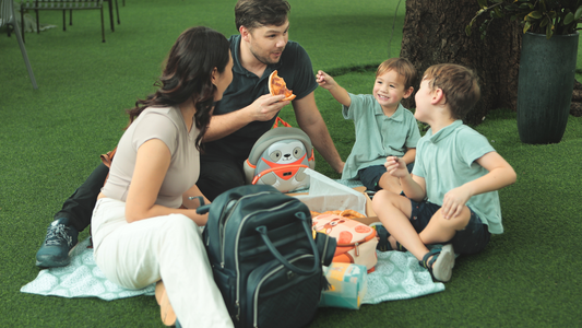 Family eating picnic